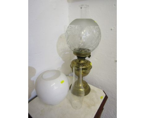 OIL LAMP, a brass based oil lamp with etched glass shade, also opaque glass shade &amp; two chimneys 