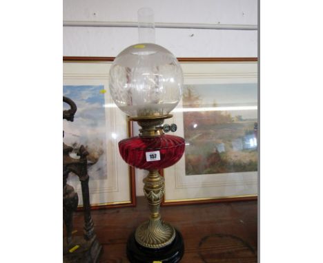 EDWARDIAN OIL LAMP, brass neo-classical column support oil lamp with cranberry glass reservoir and acid etched spherical shad