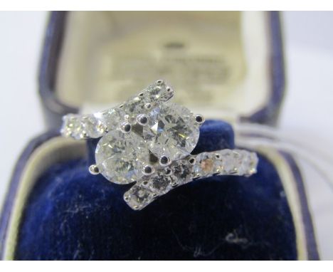 18ct WHITE GOLD 2 STONE DIAMOND BYPASS TWIST RING, 2 principal diamonds each approx 0.5ct set between 2 rows of brilliant cut