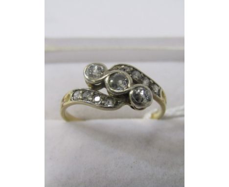 3 STONE DIAMOND RING, 3 stone cross over style diamond ring with diamond shoulders set in 15ct yellow gold, size R/S 