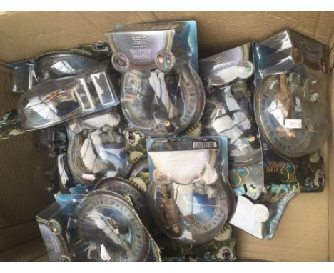A box containing a collection of, The Golden compass, carded figures