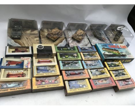 A box containing a collection of boxed diecast vehicles including Corgi, Matchbox etc