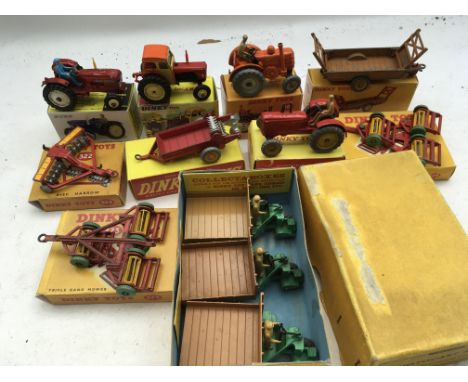 Dinky toys, some reproduction boxes, Diecast Tractors and farm implements, including Leyland 384 tractor #308, David brown tr