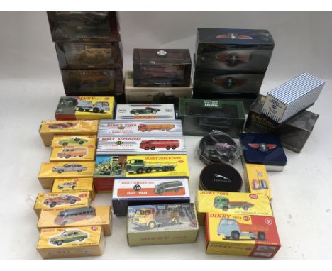 A collection of boxed Atlas Diecast vehicles including, Dinky Supertoys, Dinky, Classic coaches and a Fire Engine collection 