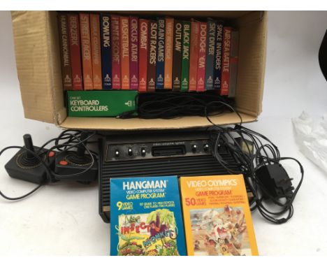 Atari video computer system, including console, Leads, controllers and boxed games