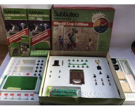 Subbuteo table soccer, World Cup edition , in mint unused condition , but box is a bit tatty also includes 2x boxed floodligh