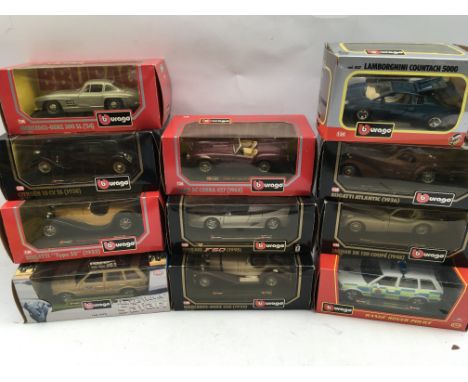 A collection of boxed Burago Diecast cars 1:24 scale including Mercedes, Range Rover, Bugatti, Jaguar, etc