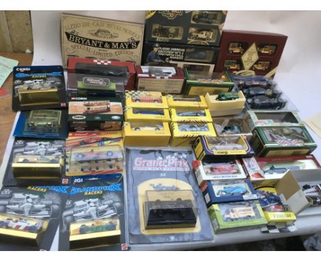 A collection of boxed and carded diecast, including Corgi, Lledo, etc