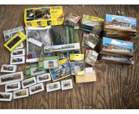 A collection of boxed HO/OO scale railway, trackside accessories included are Vollmer model kits, Airfix kits, Preiser scaled