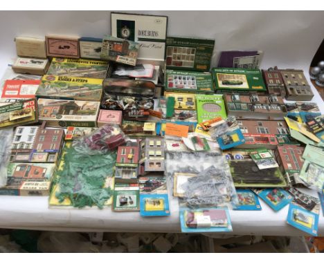 A box of OO scale trackside accessories included are Buildings, People, fencing, Vehicles, trees etc