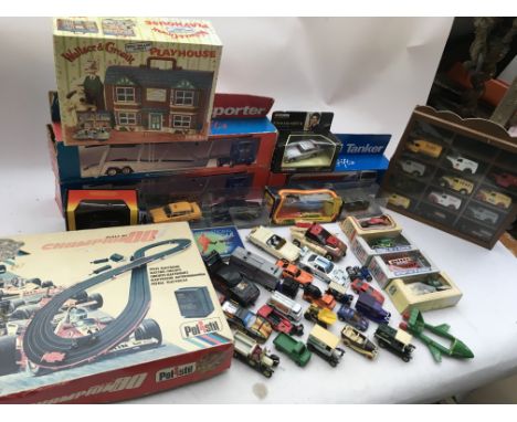 A collection of boxed and loose diecast vehicles including Corgi, Lledo etc also included is a Polistil , HO scale racing set