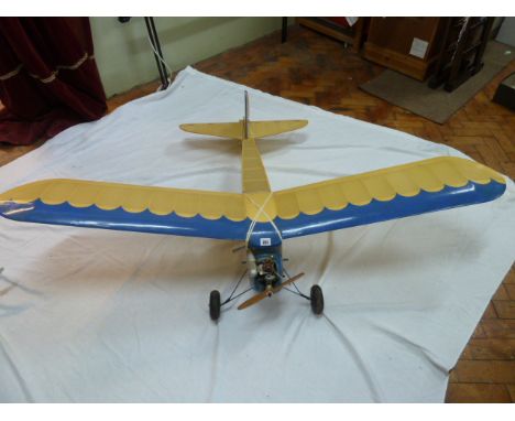 Radio controlled model Gangster aeroplane, 63" wingspan complete with engine 