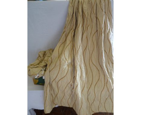 Gold coloured satin curtains