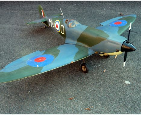 Radio controlled model Spitfire approximately 63" wingspan complete with engine 