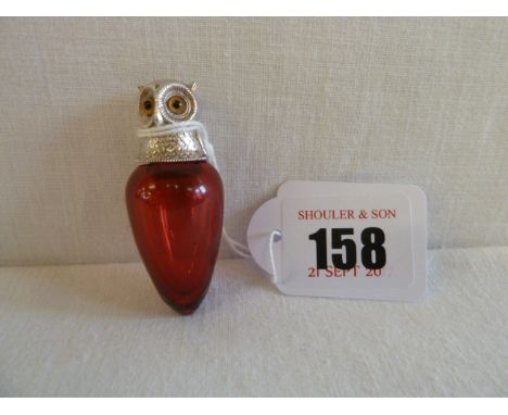Ovoid ruby glass scent bottle with silver screw cap in form of an owls head inset with glass eyes - Sampson Mordan - London 1