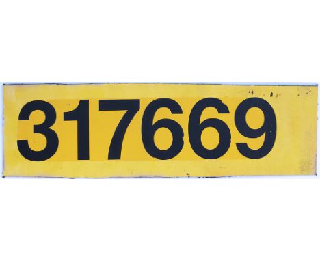 British Railway EMU class 317 saw cut aluminium number panel 317669. Measures 20.5in x 6in and is in as removed condition. Co
