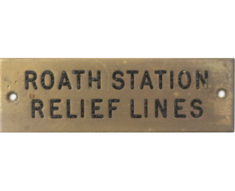 GWR machine engraved brass shelf plate ROATH STATION RELIEF LINES. In very good condition with original black wax infill. Mea