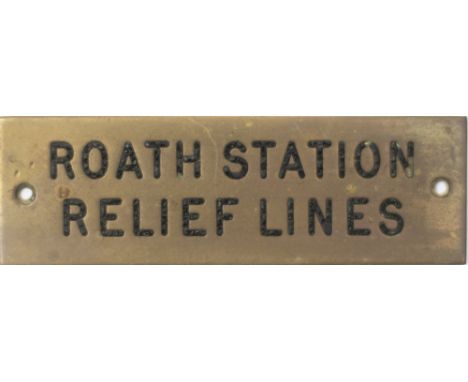 GWR machine engraved brass shelf plate ROATH STATION RELIEF LINES. In very good condition with original black wax infill. Mea