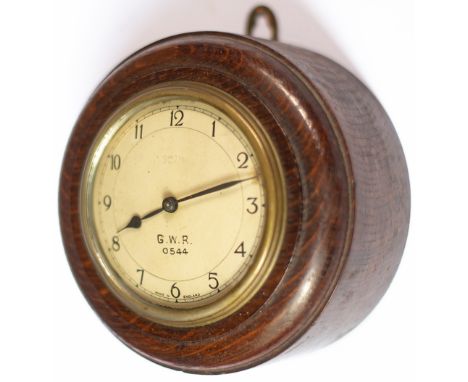 GWR post grouping oak cased Pork Pie wall clock with an English Smiths going barrel movement and dial marked GWR 0544. Measur