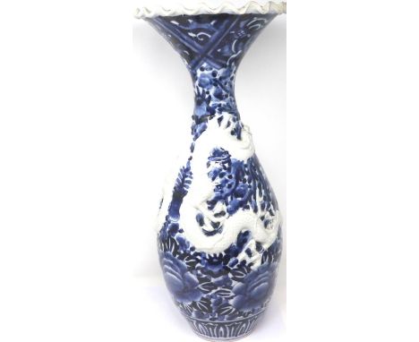 Large 19th century Japanese Arita blue and white glazed vase, applied in relief with Wrythen dragons, H: 54 cm, crack to rim.