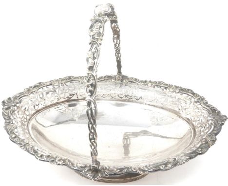 Large hallmarked silver basket with swing handle, footed with relief decoration, L: 32 cm, 770g. P&amp;P Group 2 (£18+VAT for