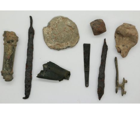 Mixed metal detecting finds including Medieval crossbow bolts and dagger chape, Civil War musket powder measure, and a 3rd ce