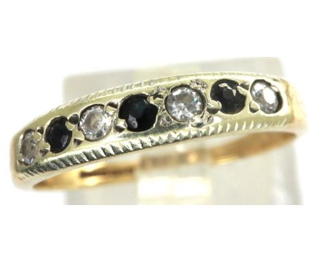 9ct gold channel set ring with sapphires and cubic zirconia, size K, 1.4g. P&amp;P Group 1 (£14+VAT for the first lot and £1+