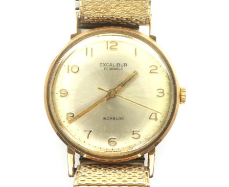 EXCALIBUR: gents 9ct gold 17 jewels wristwatch, on an expanding bracelet, working at lotting. P&amp;P Group 1 (£14+VAT for th