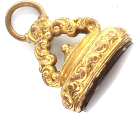 Georgian gold plated watch chain fob, set with an oval panel of carnelian, H: 35 mm. P&amp;P Group 1 (£14+VAT for the first l