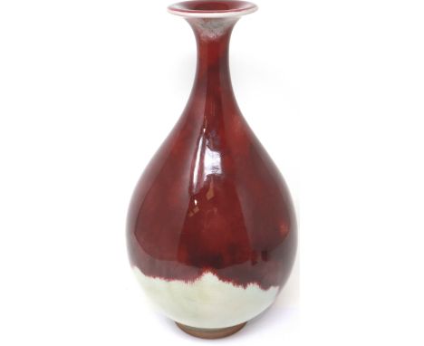 Large Sang De Boeuf glazed vase, with four character mark to base, H: 33 cm, heavy crazing, small chip to base. P&amp;P Group