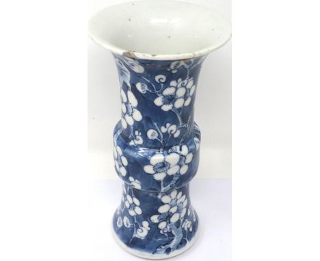 Chinese blue over white porcelain GU form vase, painted with Prunus design, bearing Kangxi four character mark to base, H: 20