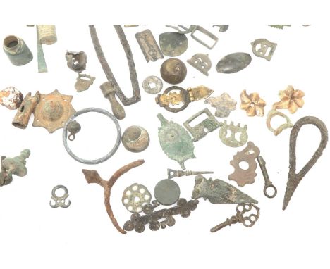 A large collection of metal detecting finds (60). P&amp;P Group 2 (£18+VAT for the first lot and £3+VAT for subsequent lots) 