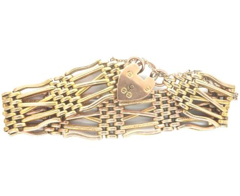 9ct gold gate bracelet with padlock clasp and safety chain, L: 20 cm, 27.1g. P&amp;P Group 1 (£14+VAT for the first lot and £