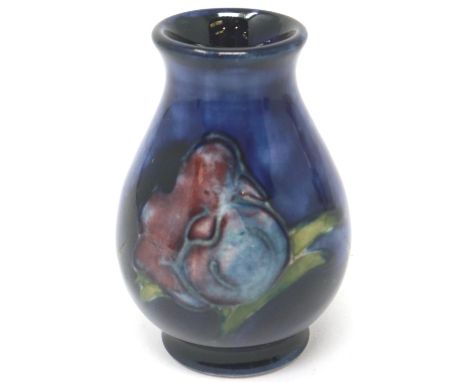 Diminutive Moorcroft stem vase, H: 60 mm, no cracks and chips. P&amp;P Group 1 (£14+VAT for the first lot and £1+VAT for subs