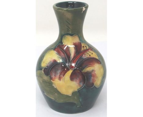 Moorcroft vase in the Columbine pattern, H: 11 cm, surface marks and crazing throughout and slight restoration to base. P&amp