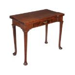 A GEORGE II MAHOGANY FOLDING TEA TABLE