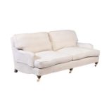 A BEECH AND UPHOLSTERED SOFA
