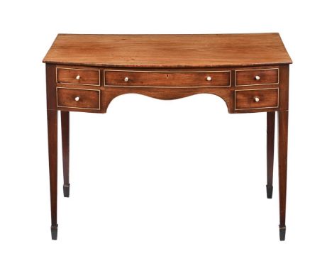 Y&nbspA GEORGE III MAHOGANY DRESSING TABLE  CIRCA 1800, IN THE MANNER OF GILLOWS  With ivory handles 70cm high, 86cm wide, 47