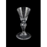 A SHORT BALUSTER WINE GLASS