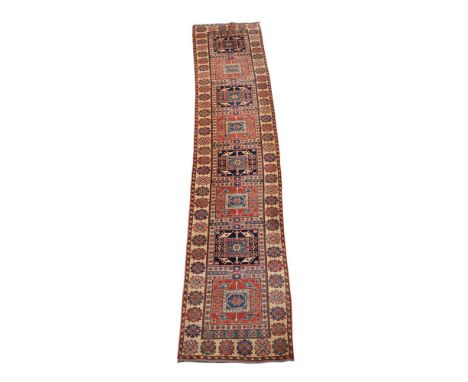 A KAZAK RUNNER  Approximately 427 x 82cmPlease note the width measurement was incorrect at time of publication, it is 82cm wi