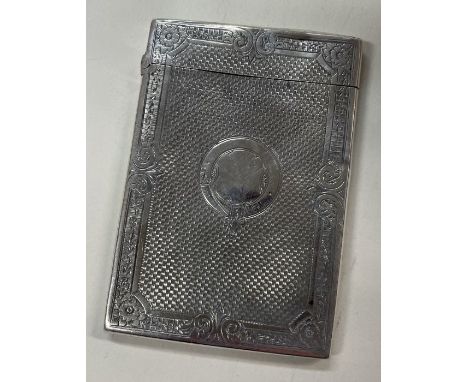 A Victorian engine turned silver card case. Birmingham 1875. By Henry Manton. Approx. 52 grams. Est. £180 - £220.