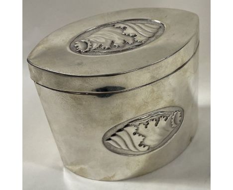 A chased silver hinged tea caddy embossed with shells. Sheffield 1902. By Thomas Bradbury &amp; Sons. Approx. 194 grams. Est.