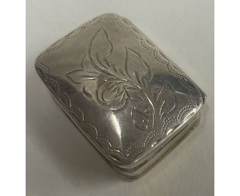 A silver engraved hinged box. Import marked. Approx. 15 grams. Est. £20 - £30.