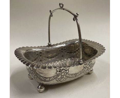 A chased Victorian silver basket embossed with swags. Sheffield 1890. By James Dixon &amp; Sons. Approx. 210 grams. Est. £200