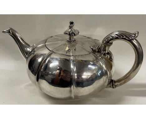 PAUL STORR: A fine William IV pumpkin shaped silver teapot. London 1831. Approx. 635 grams. Est. £2000 - £3000.