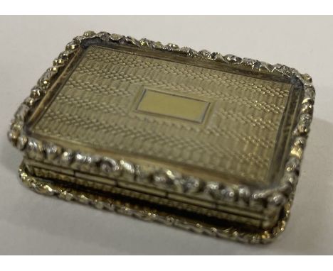 An engine turned silver gilt vinaigrette. London 1841. Approx. 28 grams. Est. £200 - £300.