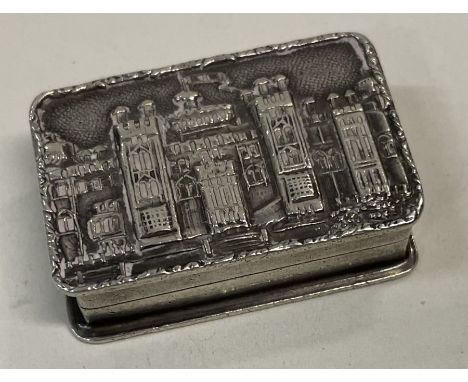 A silver castle top snuff box engraved with Windsor Castle. Birmingham 1977. By SJR. Approx. 19 grams. Est. £100 - £200.