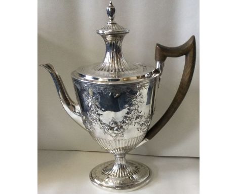 An large 18th Century silver coffee pot. London 1792. By John Robins. Approx. 862 grams. Est. £600 - £800.