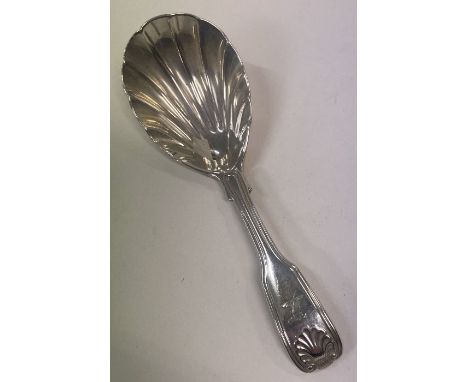 A heavy fluted Victorian silver caddy spoon. London 1857. By George Adams. Approx. 32 grams. Est. £40 - £60.