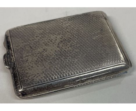 A silver engine turned stamp case. Birmingham. Approx. 33 grams. Est. £30 - £50.